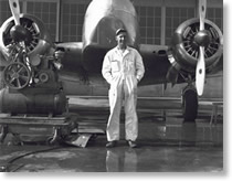 Ben in front of an aircraft at Fleming Field