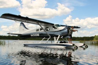 Fishing from a Wipline 6100 float on a de Havilland Beaver