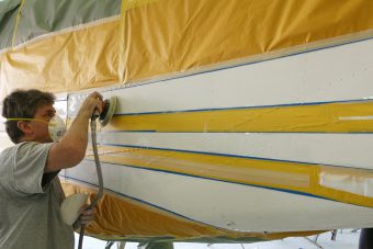 Stripes masked and being abraded for painting