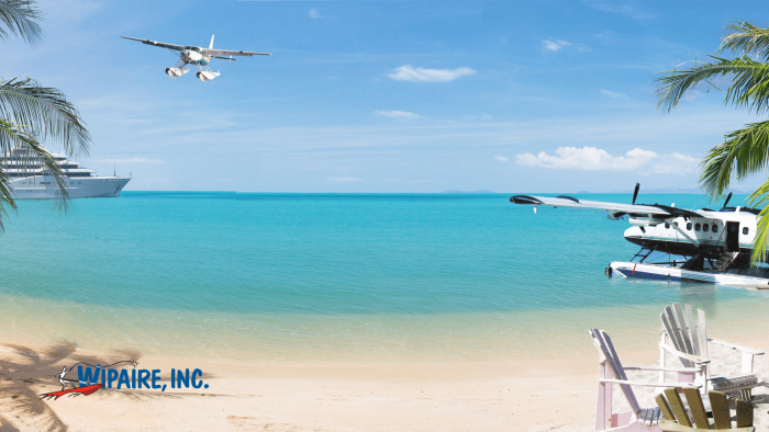 Meeting background with a Grand Caravan and Twin Otter at the beach.