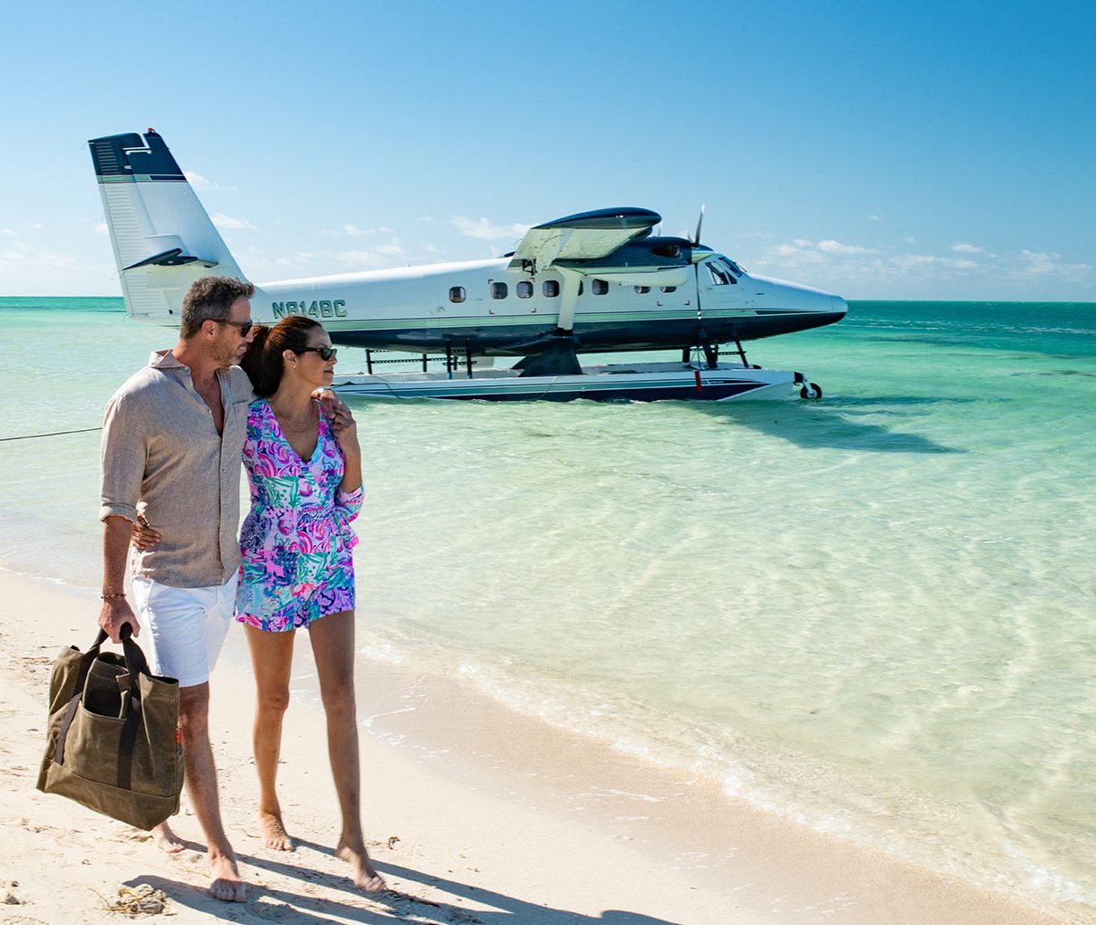 walking away from a Twin Otter on Wipline 13000 Floats